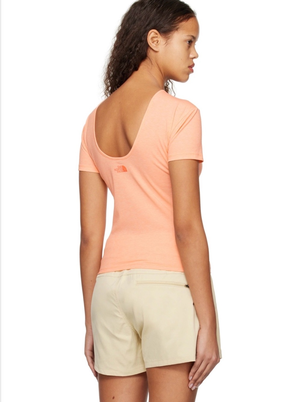 The North Face Women's Scoop-Back Short Sleeve Tee in Peach